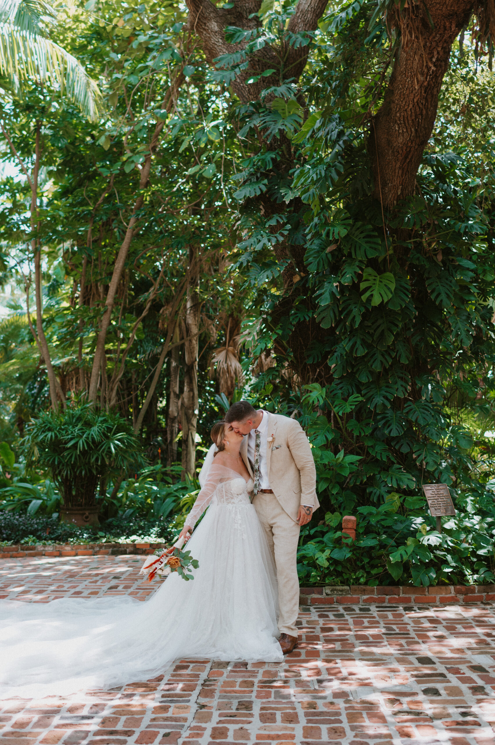 Newly married couple in Hawaii eloping in the forest